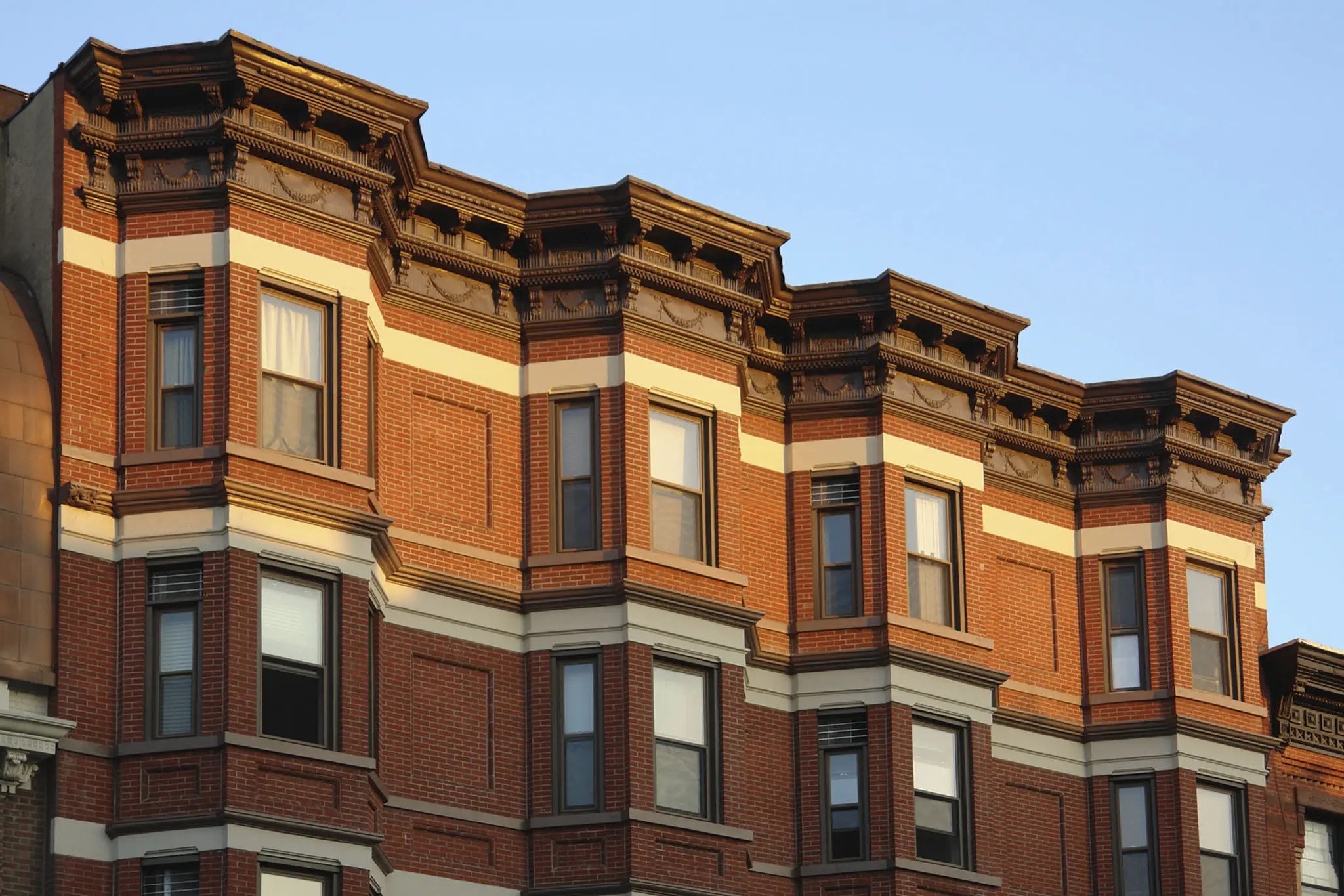 Sunlit facade of urban architecture