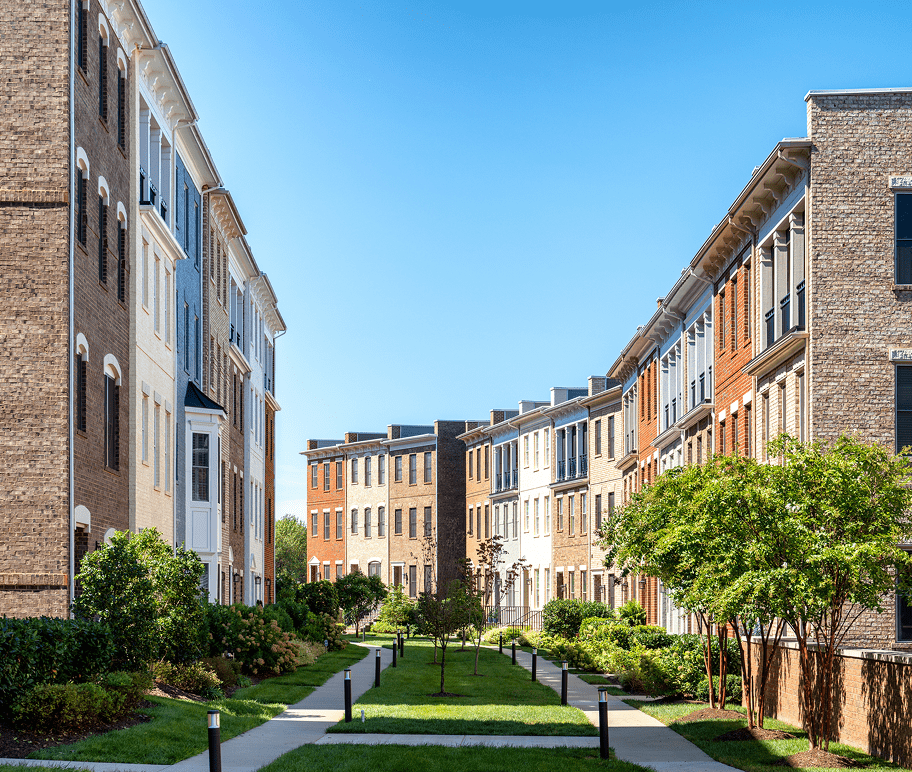 Brick buildings and green pathway
